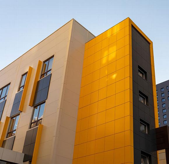 flats covered in yellow fireproof cladding